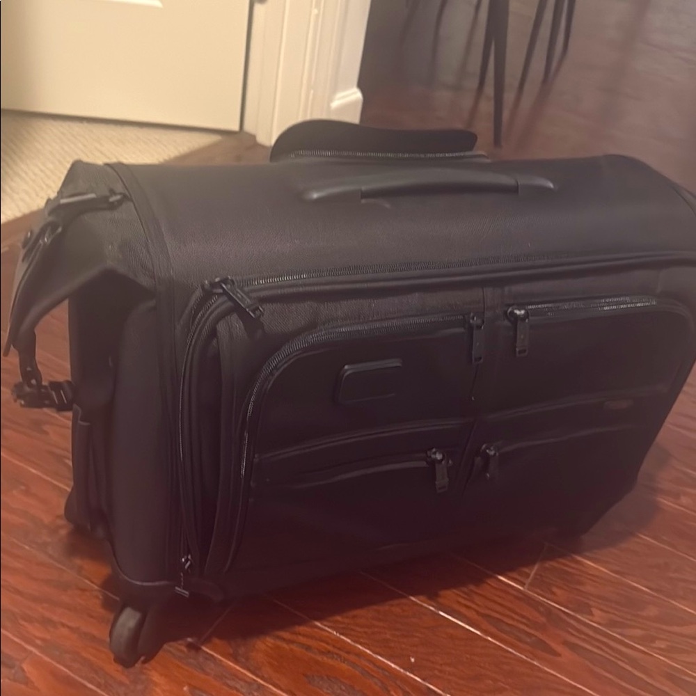 Tumi Black Luggage Travel Bag with Wheels
